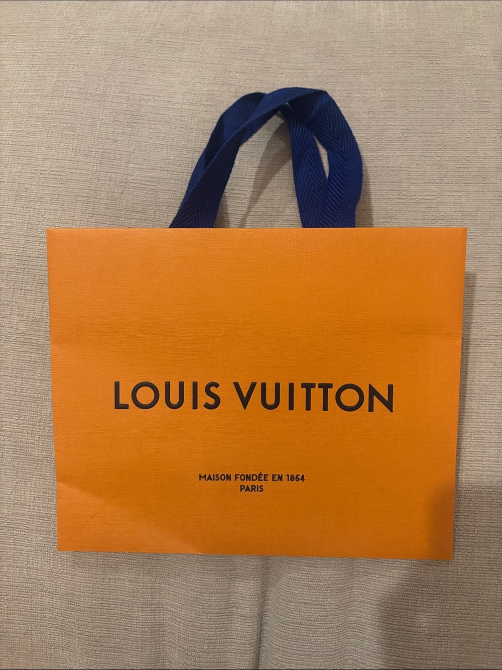 Louis Vuitton Orange Bag with Navy Handles